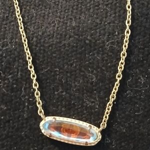 Elegant Gold Necklace with Blue Gemstone